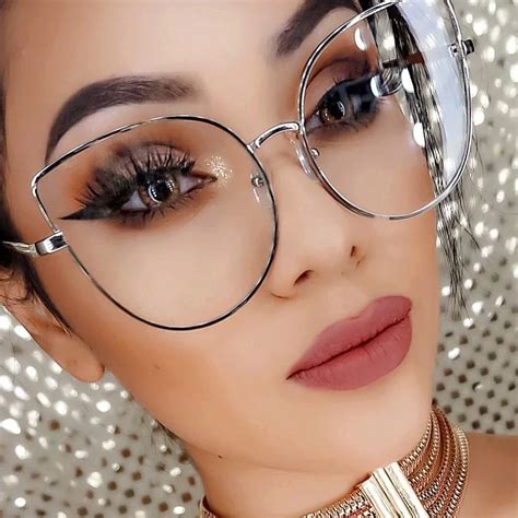 oversized gold cat eye glasses.